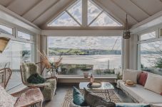 Luxury waterside holiday home in Teignmouth with panoramic estuary views and a spacious furnished terrace